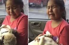 girl cries dog over
