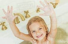 little girl bathtub adorable camera stock smiling sitting raising hands while