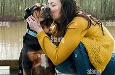 dog kissing woman alamy stock dock oregon her