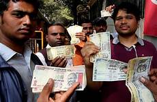 india indian rupee people paying cash war off mumbai lined reserve deposit bank outside old wsj late notes december