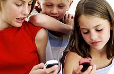 kids phones cell children parenting parents other young internet family technology girls using phone own mobile standing cellphones use child