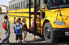 bus school elementary students stock