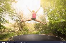 trampoline girl teenage jumping outdoors stock alamy jump doing star