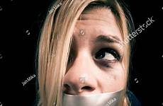kidnapped hostage tape mouth woman over shutterstock rope tied stock