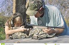 shoot teaching man firearm stock girl