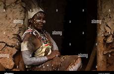 kenya kikuyu nyeri woman hut highlands central her africa village alamy stock sniffer glue child east boy
