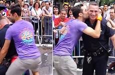gay pride parade officer nypd cop gets down paige dance