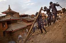 earthquake nepal kathmandu durbar rescue basantapur damaged debris policemen nepalese quake cn