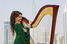 harpist female harp player players