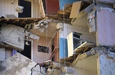 apartment russian collapse building after rubble rescued hours baby officials rule attack monday associated press 1400 partially russia cbc