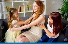 mother tickling daughters two tickle mom playing preview