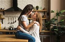 lesbian couple passionate kitchen young each other loving