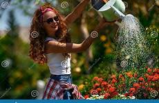 watering flowers woman garden beautiful