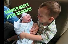 brother baby big meet first time