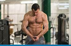 hairy flexing muscles bodybuilder fitness man preview