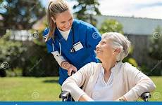 care nurse patient elderly taking caring senior take old disabled doctor outdoor preview stock