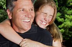 giving father daughter ride piggyback caucasian dissolve stock royalty d145