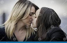 kissing women two stock