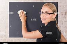 cleaning blackboard school stock girl alamy closeup teacher portrait young beautiful