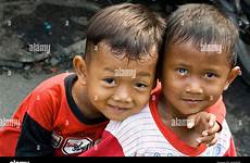 boys indonesia indonesian cute stock alamy young pasar ikan jakarta two