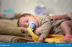 binky baby child newborn sucking extremely sleeping cute healthy development stock