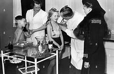children doctor alamy examining 1943 company
