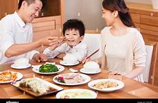 family eating meal happy time chinese rice enjoying father son stock alamy