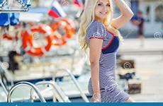 striped dress beautiful sexy boats blonde near posing sailor wearing sea woman stock