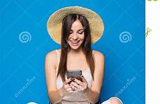 chilling pretty woman hair long chair typing hat phone background blue preview