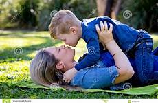 whilst mother kiss embracing playing son young preview