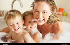 bath mother children bubble relaxing filled alamy stock shopping cart