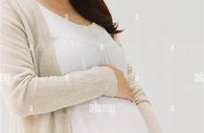 pregnant japanese young woman alamy stock pricing