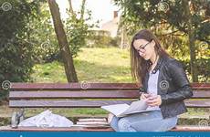 exam eyeglasses bench sitting study reading college books young park school beautiful girl diary book