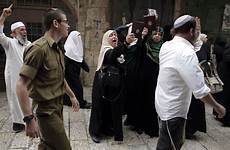 muslim israel mosque jerusalem aqsa outlaws guards civilian banning protest guarding members