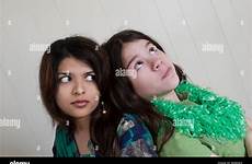 stepsister indian alamy stock caucasian posing preteen together woman young her