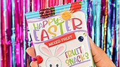 how cute is this Easter fruit snack party favor!? Would make a great DIY Easter basket stuffer. Custom fruit snack wrappers are easy to make when using mini 5x7 Party Printables Paper. Simply print borderless, wrap and seal. #prettypartyandcrafty #partyprintablespaper #easter #papercrafting #diycrafts | Pretty Party & Crafty
