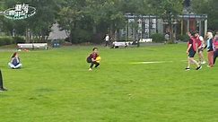 Joyful Moments: International Students Playing Frisbee in Deqing