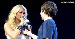 Carrie Underwood gives fan his first kiss