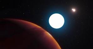 Massive Planet Found Within a Triple-Star System
