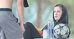 Ireland Baldwin reads book on sidelines while beau plays soccer