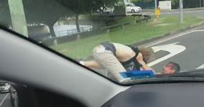 Dramatic road rage footage: Two men caught in brawl on Australian road