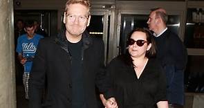 Kenneth Branagh And Wife Lindsay Brunnock Holding Hands At LAX