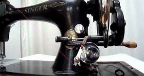 How to wind a Singer sewing machine long bobbin and load the shuttle the correct way