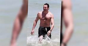 Hugh Jackman Takes a Shirtless Swim in Australia | Splash News TV | Splash News TV