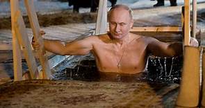 Shirtless Vladimir Putin takes dip in icy Russian lake for the Epiphany