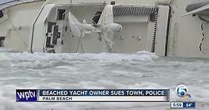 Beached yacht owner sues town, police