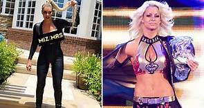 WWE star Maryse suffers wardrobe malfunction as boobs pop out of dress