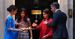 Rishi Sunak and family light Diwali candles outside No 10