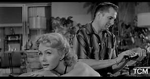 Rhonda Fleming and Vincent Price in WHILE THE CITY SLEEPS