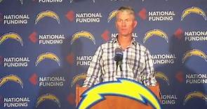 Mike McCoy is at the podium to... - Los Angeles Chargers